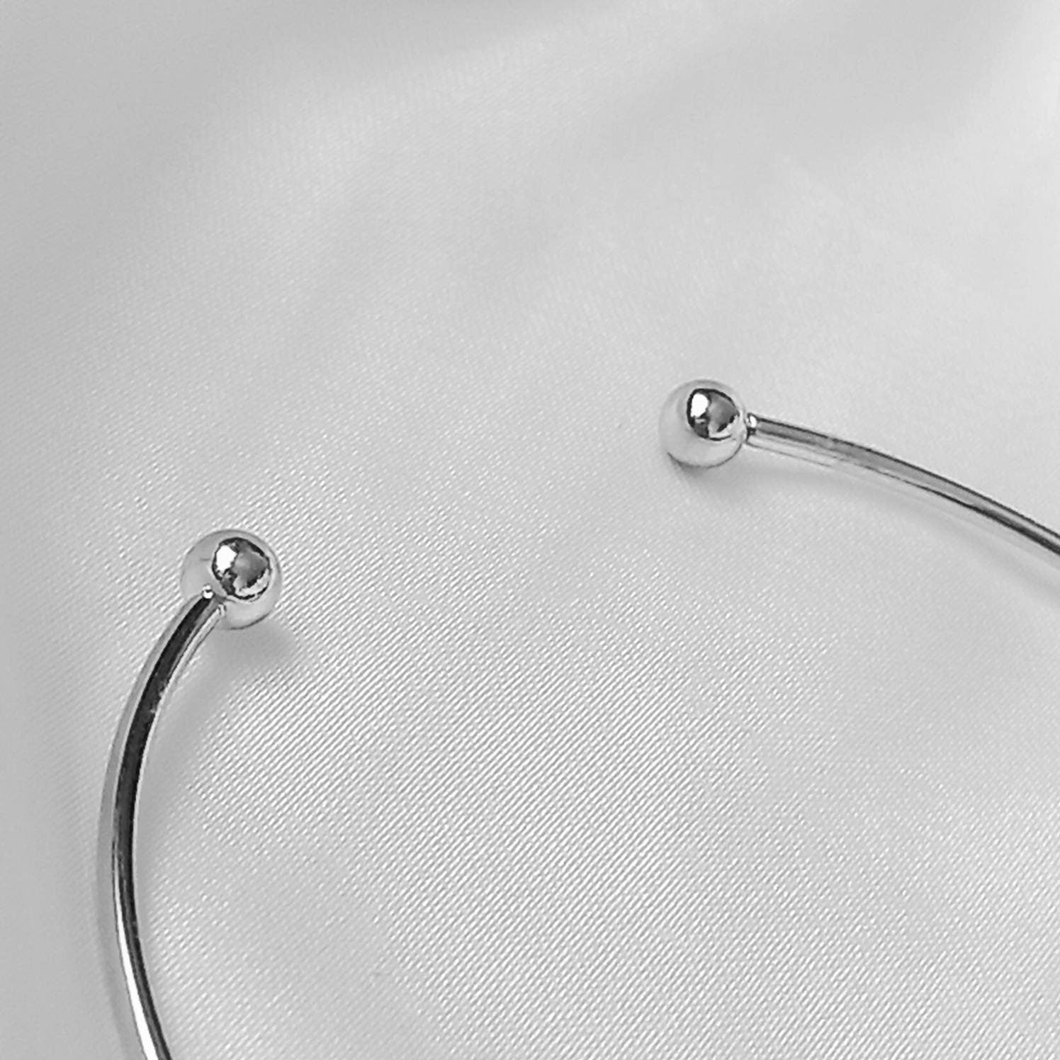 Silver Feather Bangle Bracelet